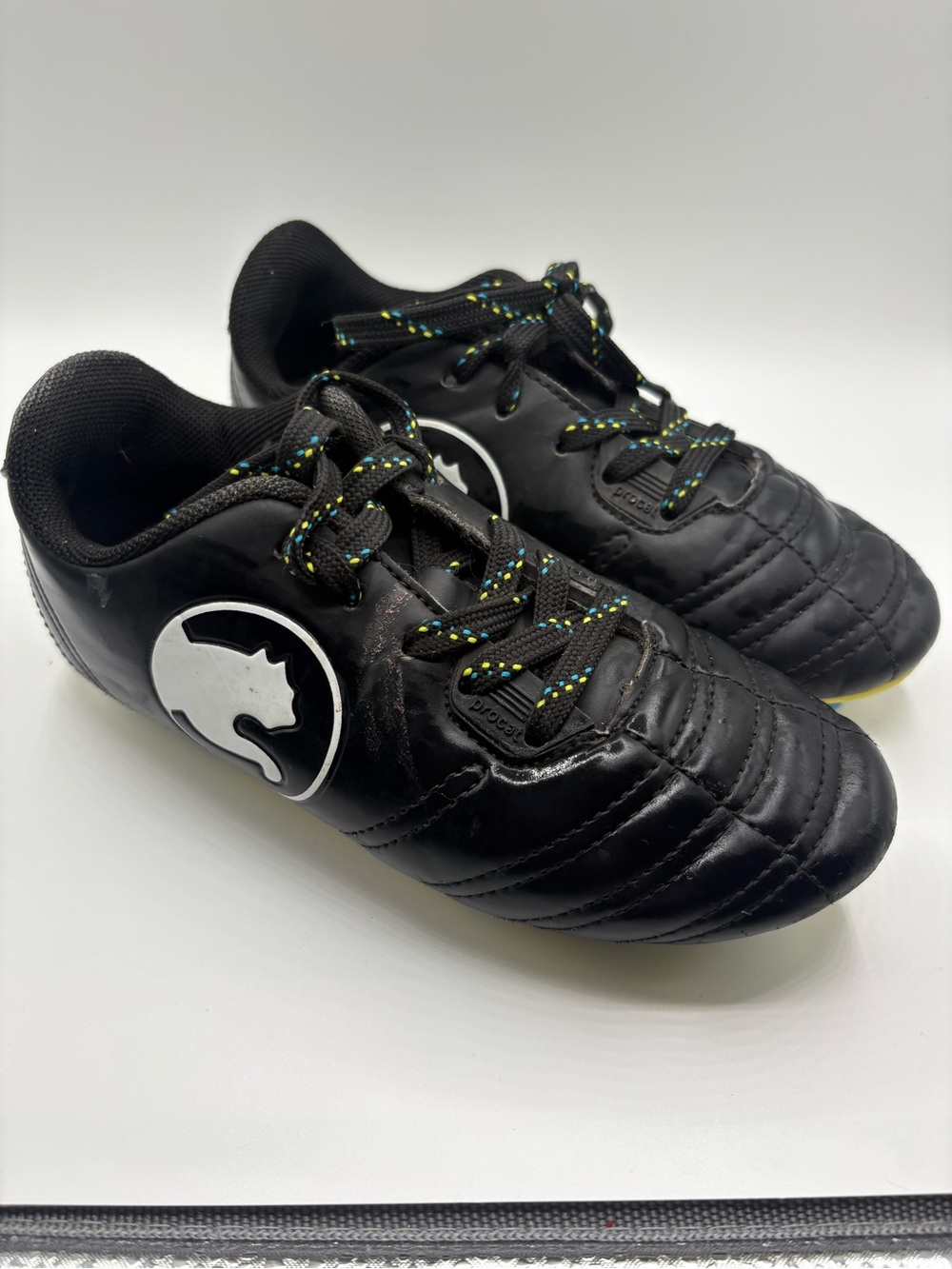 Puma Kids Black Soccer Sneakers with Multicolor Accent Laces